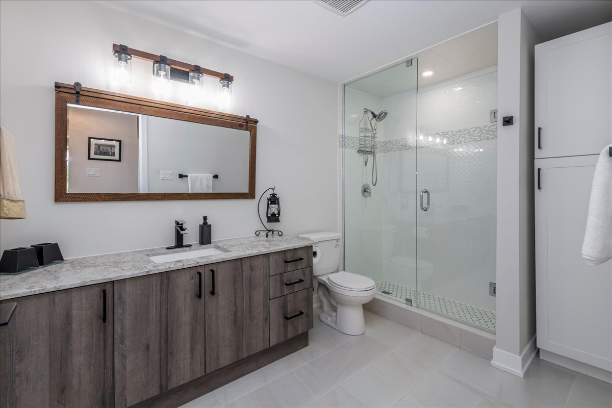 Upgraded bathroom with glass shower at 301 - 8 Culinary Lane, Barrie